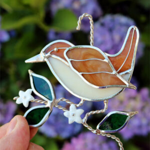 Stained glass wren bird.
